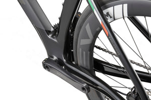 Close-up of the rear wheel and frame of a Masi EVOLUZIONE 1, highlighting its aerodynamic design and detailed tire branding.