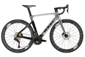 EVOLUZIONE 1: A high-performance racing bike in silver and black with an aerodynamic frame and disc brakes on a white background.