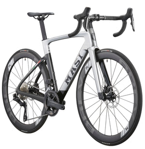 The sleek silver EVOLUZIONE 1 road bike features an aerodynamic design, streamlined frame, drop handlebars, and deep-section wheels.