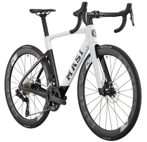 High-performance EVOLUZIONE 1 road bike with aerodynamic design, drop handlebars, deep-rimmed wheels, and MASI labeled on the frame.