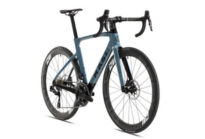 A sleek EVOLUZIONE 1 Carbon road bike by Masi Bikes, featuring a light blue and black frame with aerodynamic handlebars, disc brakes, and deep-section wheels for speed and efficiency.
